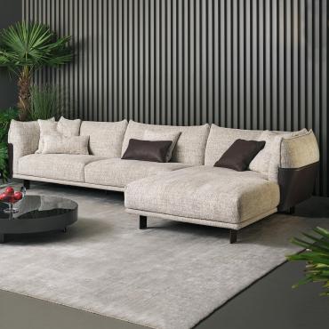 Blend sectional sofa in belting leather and fabric by Bonaldo
