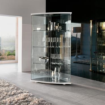 Gracia display cabinet with doors and back in curved clear glass and black matt lacquered structure.