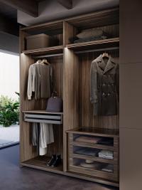 Example of layout inside a Lounge wardrobe, with chest of drawers, trouser rack and shelves with rod.