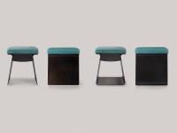 Couple of Calvin pouffe stools with open and closed metal strcutures and cushions upholstered in leather