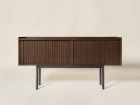 Katen sideboard in brown tinged ash wood, with high base in black matt lacquer