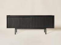 Katen low sideboard with ribbed fronts in black tinged solid wood