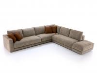 Corner composition of Clive sofa, with pouf and decorative cushions
