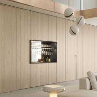 Storage wall consisting of lounge bar compartment and wardrobe columns