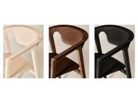 Ashina chair with covered seat in the available finishes. From left to right: natural ash wood, brown ash wood, black ash wood.