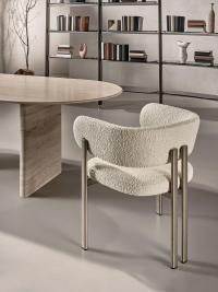 Mailea armchair with armrests upholstered in bouclé fabric combined with Luxor bronze brushed metal legs