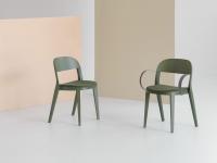 Minima chair with upholstered seat, here in the version with or without burnished brass metal armrests