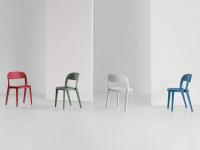 Minima chairs all made of wood, offered here in stained ash in Red Cherry, Olive Green, White and Sky Blue