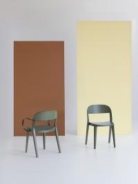 Minima wooden chairs in the version without armrests and with armrests in black embossed metal