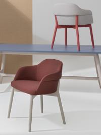 Sophos modern chair upholstered in fabric, characterised by soft, welcoming lines