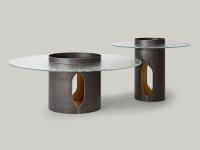 Bullet cylinder-shaped coffee table with glass top available as an end table too for a use on the sofa side