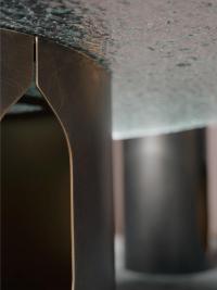 Detail of the central window of the Bullet coffee table. Also notice how the entire structure is a thin sheet of curved sheet metal, a minimalist and lightweight solution