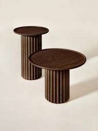 Shinden side table in brown-stained ash, a tribute to dark woods ideal for pairing with light-colored upholstered complements and creating interesting color contrasts in the heart of the living room