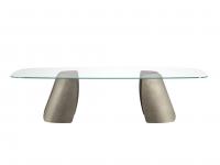 Akeyo shaped glass top table characterised by its special curved shapes and lines