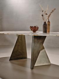 Detail of the folding of the metal sheet that forms the two mirrored legs of the Birkey table